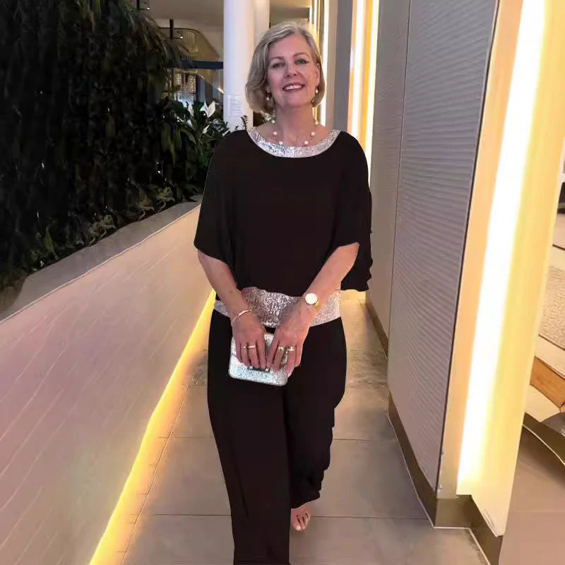 Damen Elegante Jumpsuit mit Schimmerndem Taillenbund Heidi-Mode