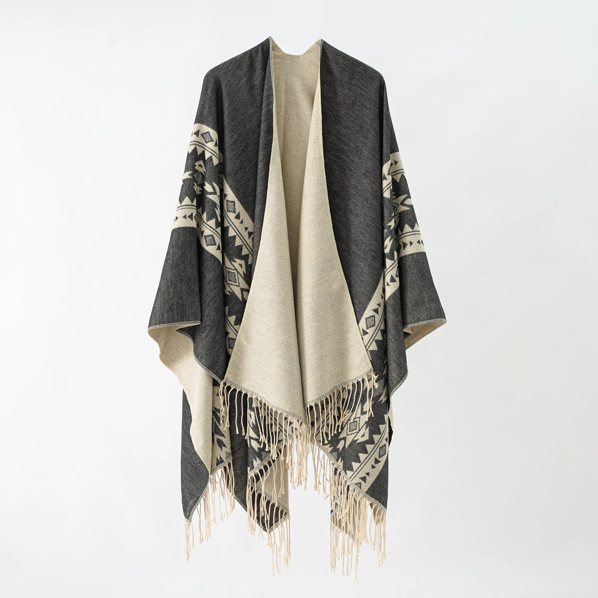 Damen Eleganter Strickponcho mit Kunstvollen Fransen und Floralen Akzenten Heidi-Mode
