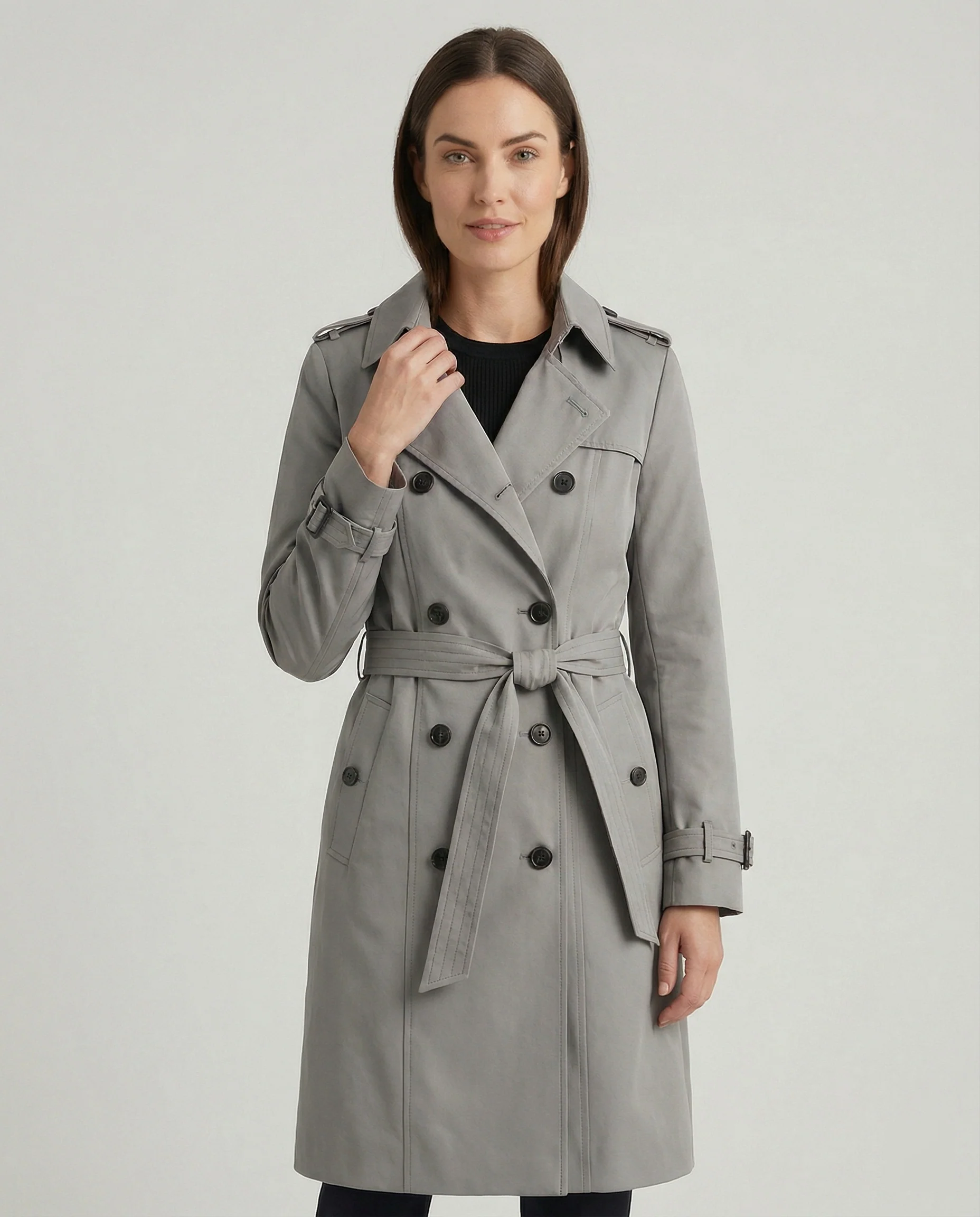 Damen Fashion Trends weit geschnittener doppelreihiger Trenchcoat mit Taillengürtel und Schulterpatten Heidi-Mode