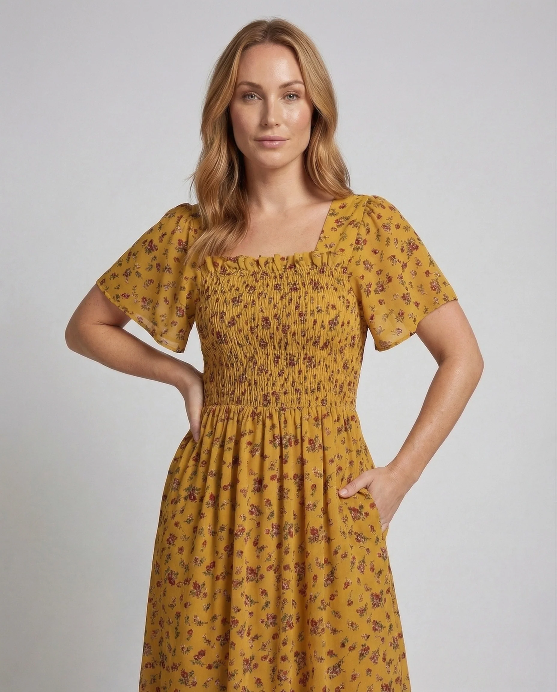 Damen Sommerkleid mit Smokoberteil Puffärmel Volantrock - Image 2