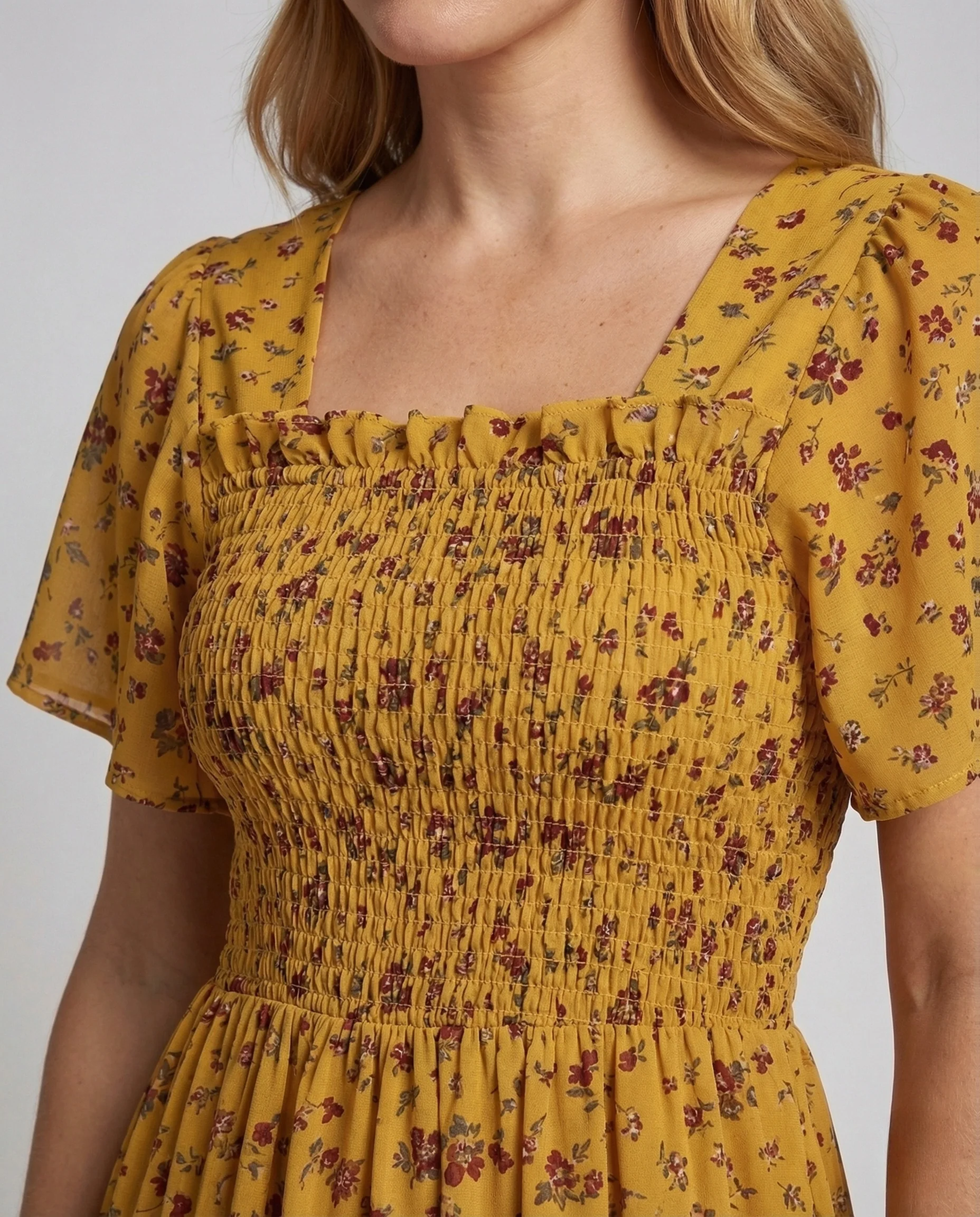 Damen Sommerkleid mit Smokoberteil Puffärmel Volantrock - Image 3