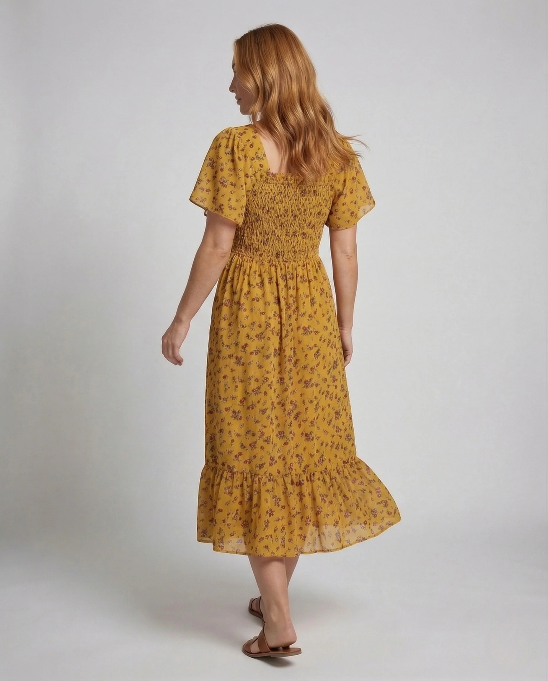 Damen Sommerkleid mit Smokoberteil Puffärmel Volantrock - Image 4