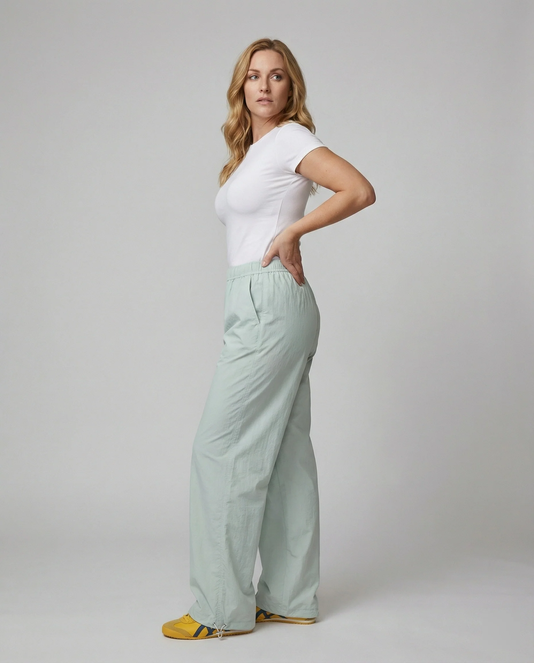 Weite Palazzo-Hose mit elastischem Gummibund, Eingrifftaschen und Kordelzugsaum Heidi-Mode