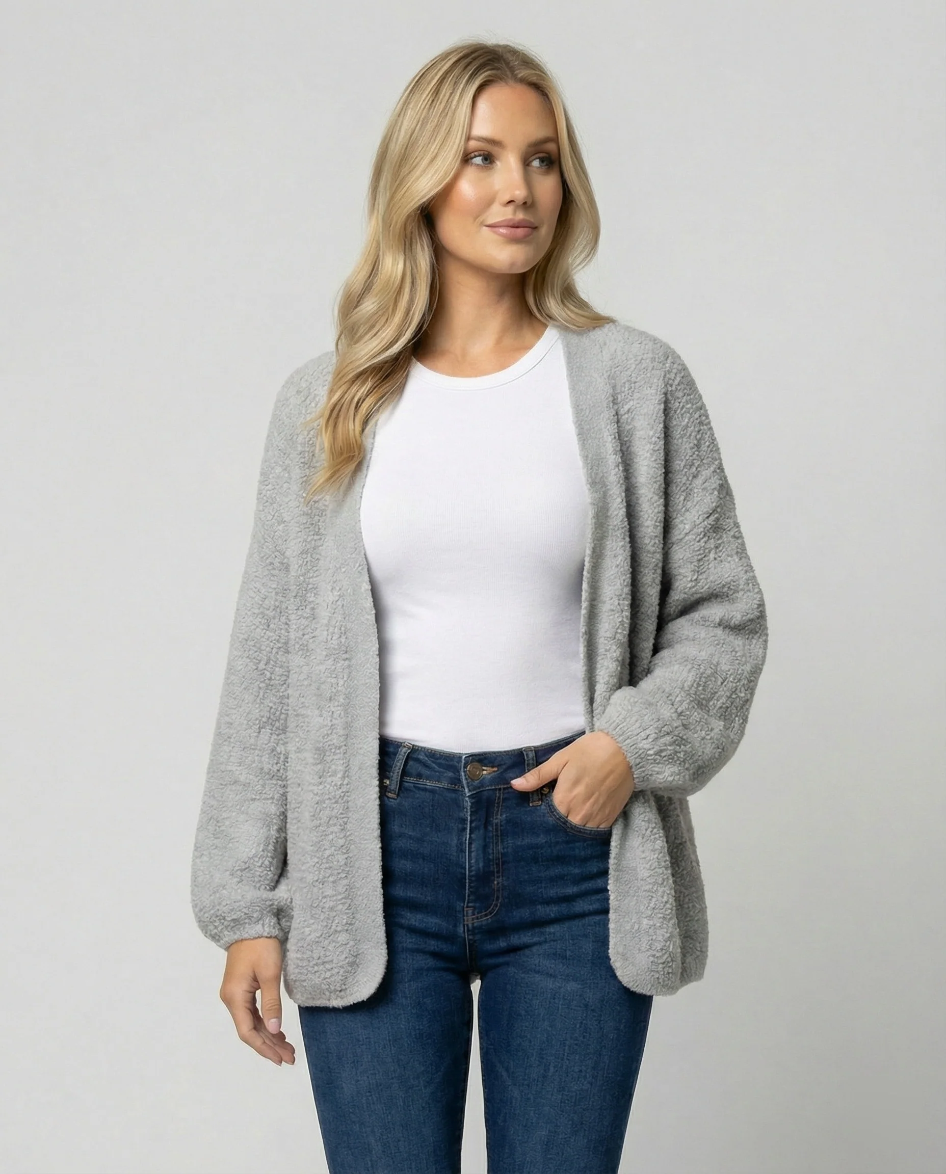 Damen offener Strukturcardigan im Mantelschnitt mit Ballonärmeln und abgerundetem Saum Heidi-Mode