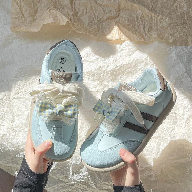 Damen Sneakers mit verspieltem Design und dekorativen Schleifen Heidi Mode
