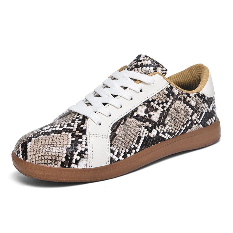 Damen Sportliche Sneakers mit elegantem Schlangenmuster Heidi Mode