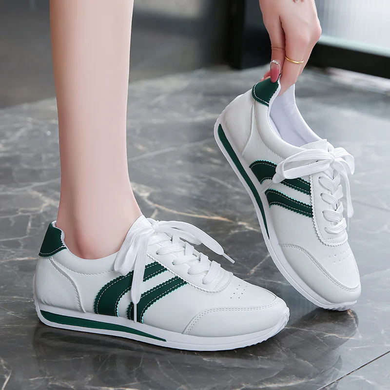 Damen Sportliche Sneakers mit klassischem Design und atmungsaktiver Oberflächenstruktur Heidi Mode