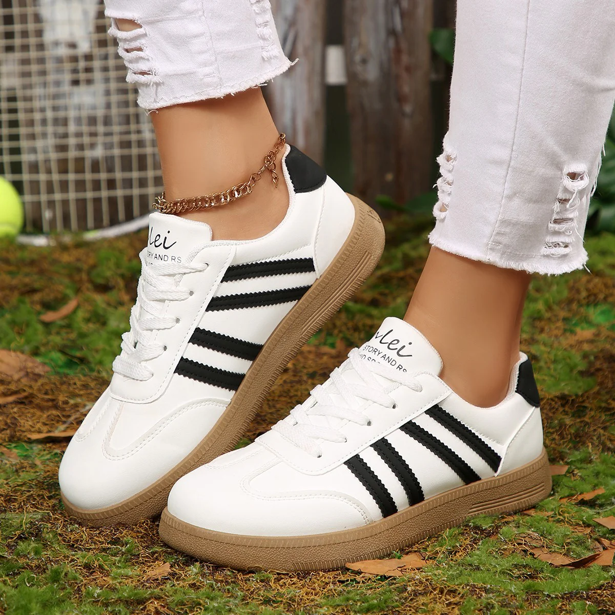 Damen Sportliche Sneakers mit klassischem Streifendesign Heidi Mode