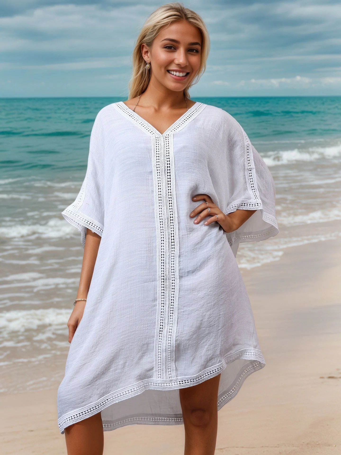 Damen Strandkleid mit Dekorativen Häkel-Details und Asymmetrischem Saum Heidi-Mode