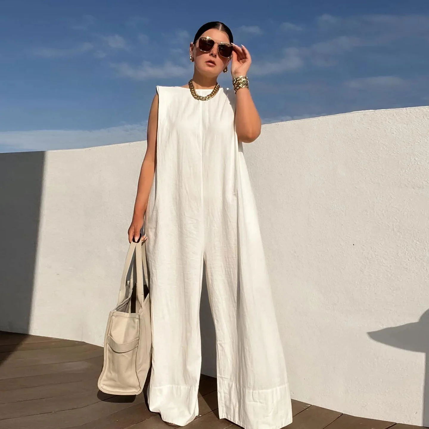 Damen Weit geschnittener Jumpsuit mit Kapuze und tiefer Taille Heidi-Mode - Image 4