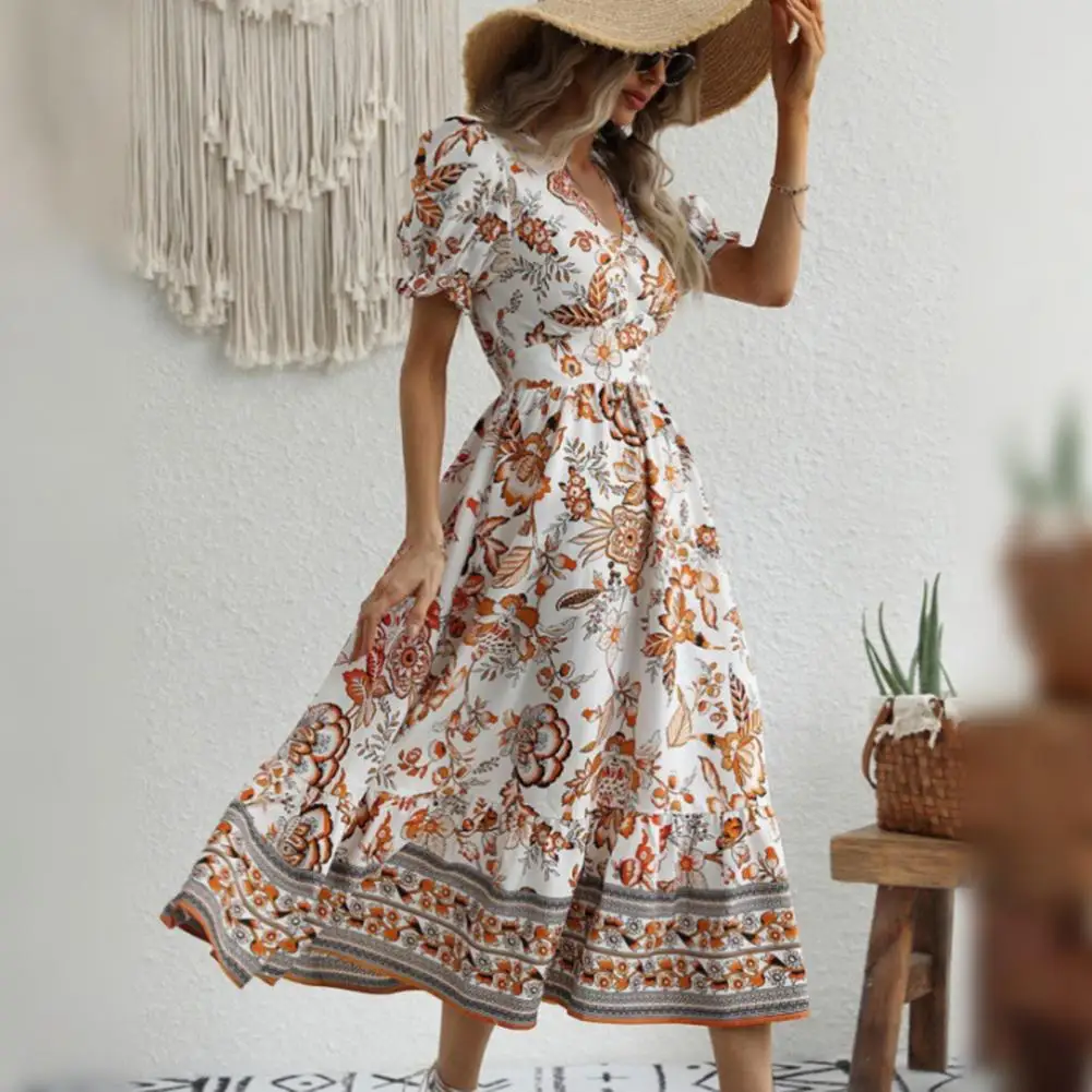 Heidi-Mode | Elegante Orange Blumenkleid