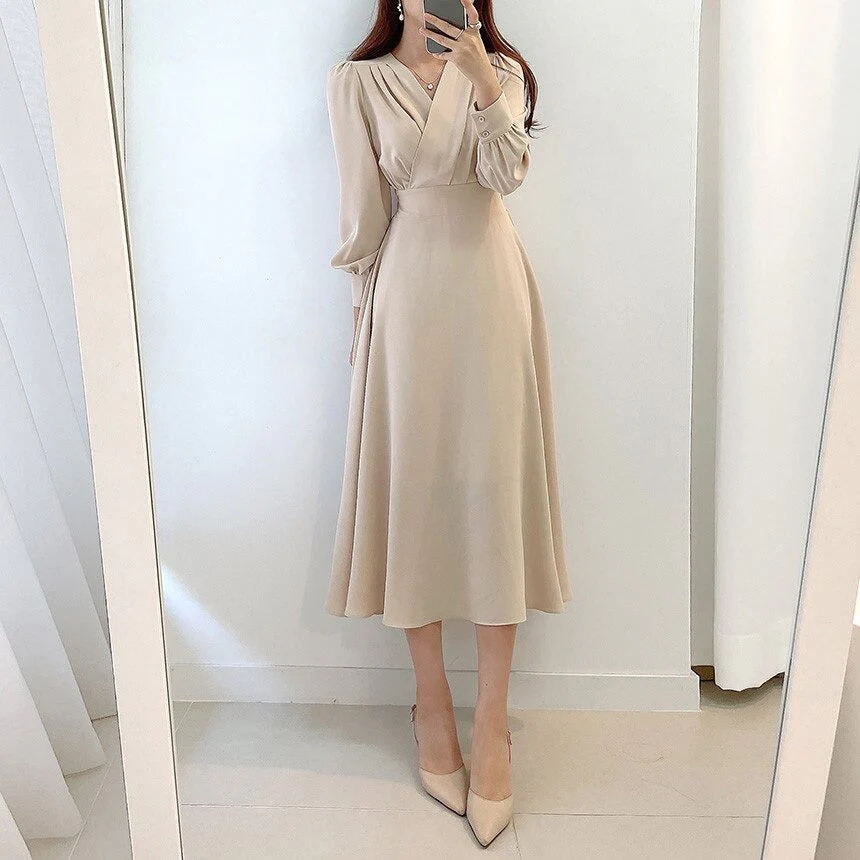 Heidi-Mode | Elegantes Kleid mit Puffärmeln und V-Ausschnitt In A-Linie