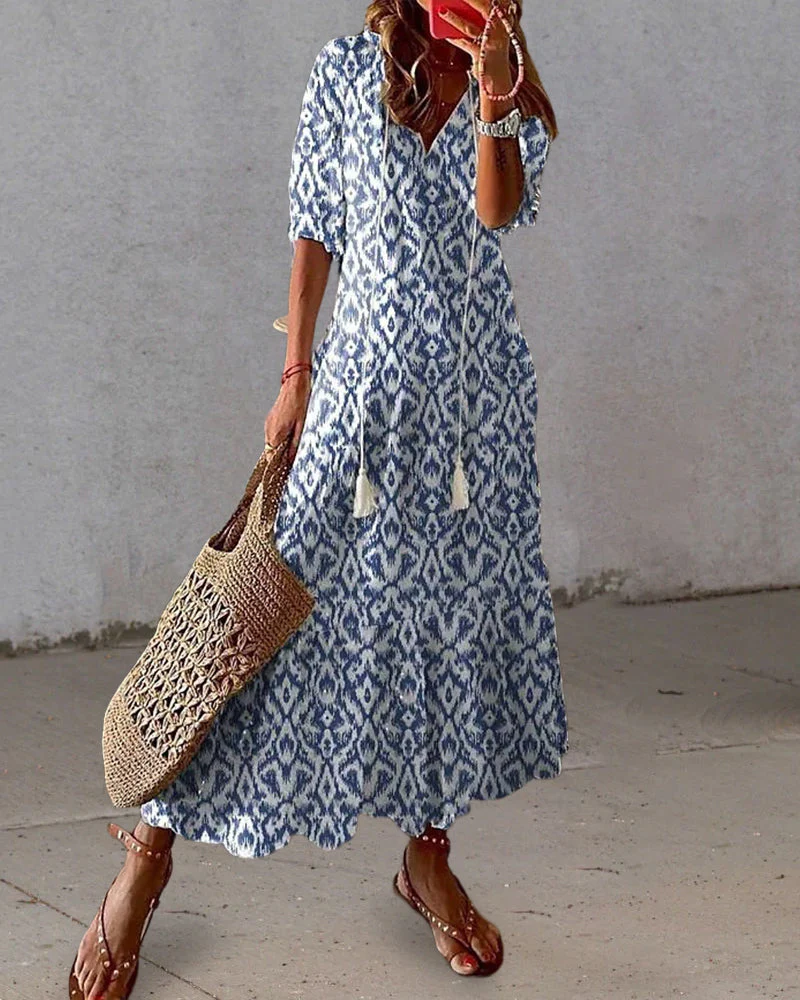 Heidi-Mode | Maxikleid Im Boho-Ikat-Print mit Quastenbändern Lässiges Maxikleid Im Bohemian-Stil mit V-Ausschnitt