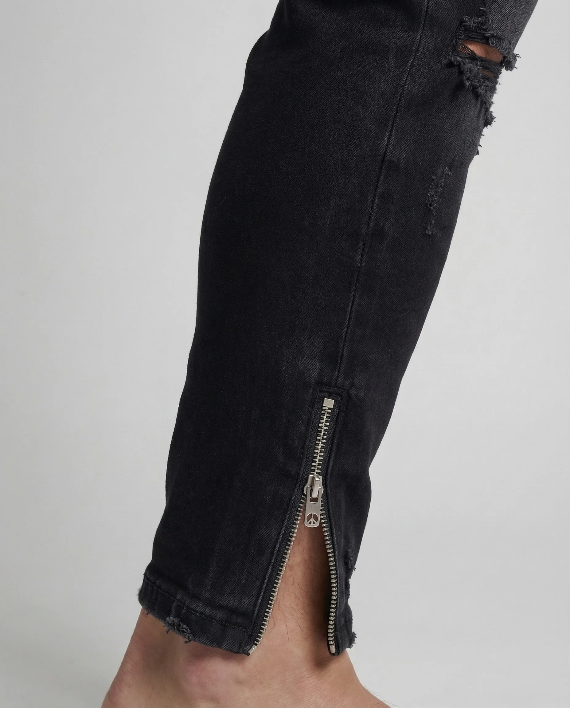 Herren Skinny Jeans mit Rissen & Saumreißverschluss - Image 3