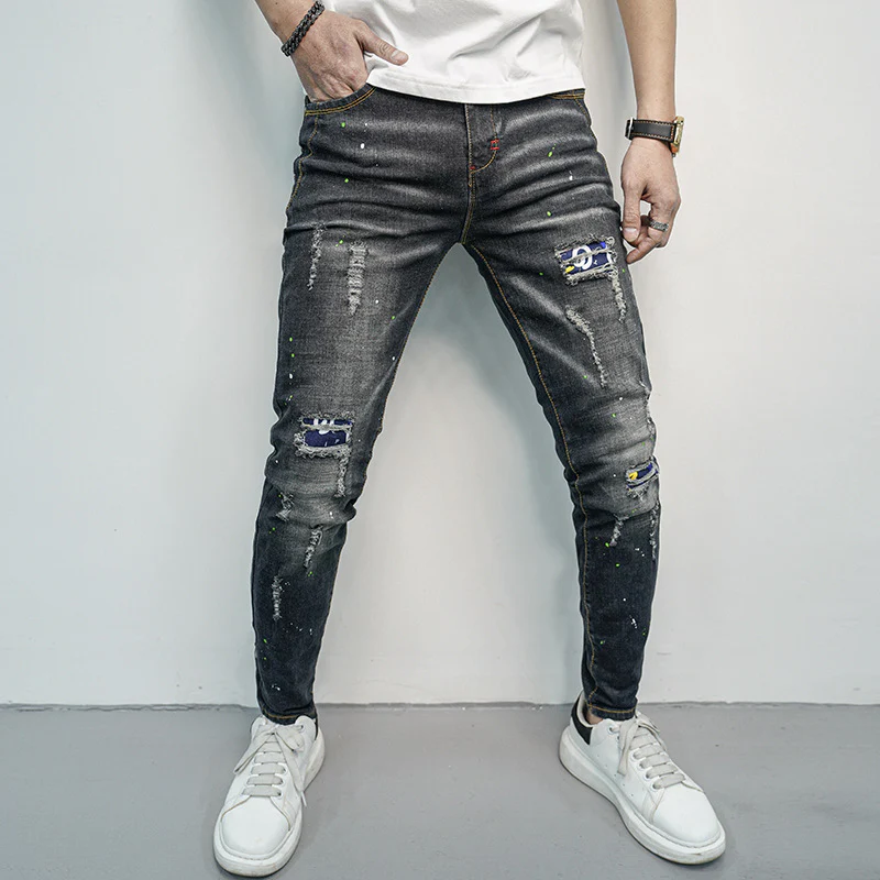 Herren Skinny Fit Jeans im kreativen Rissdesign und bunten Farbsklecks Heidi-Mode - Image 2