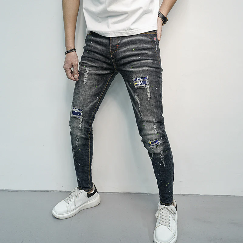 Herren Skinny Fit Jeans im kreativen Rissdesign und bunten Farbsklecks Heidi-Mode - Image 4