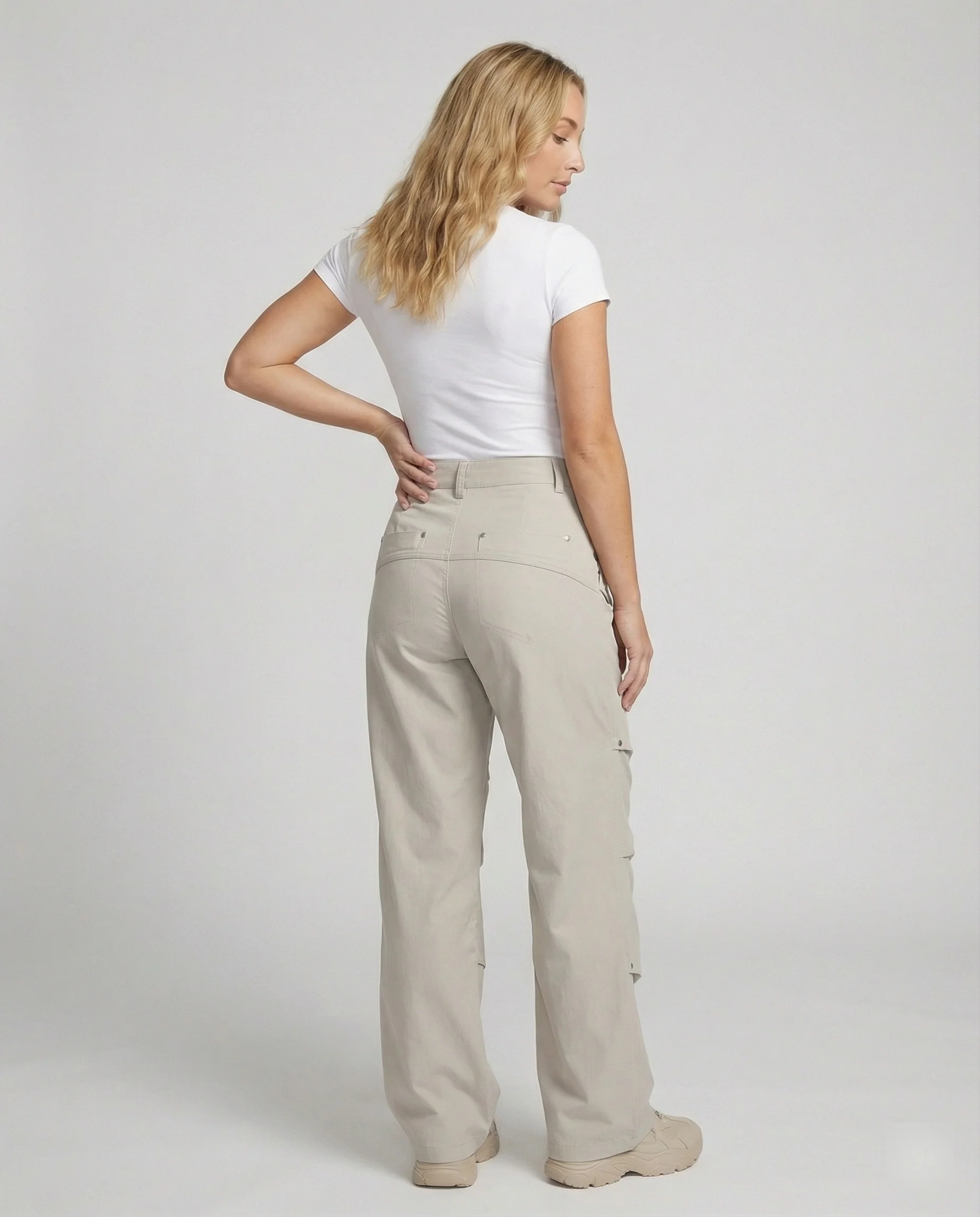 Weit geschnittene hochtaillierte Statement-Hose mit asymmetrischen Paneel-Falten und Zierdruckknöpfen Heidi-Mode - Image 6